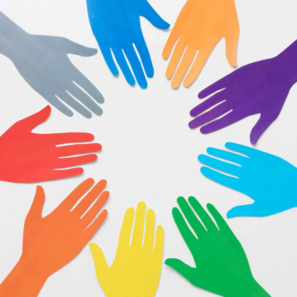 Diversity layout with paper hands in different colors
